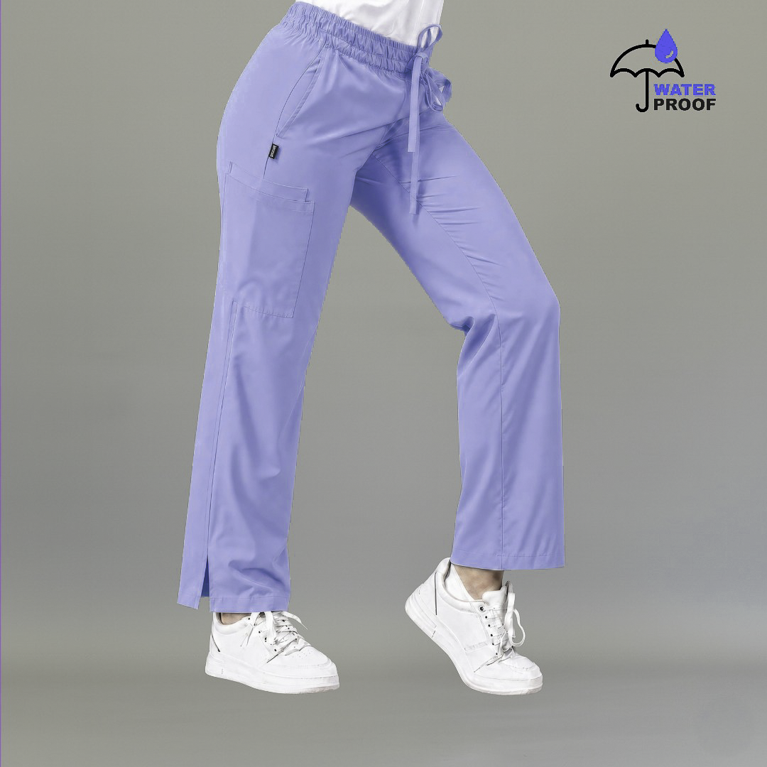 Vista lateral de pantalón quirúrgico 502 mujer azul plumbago.
