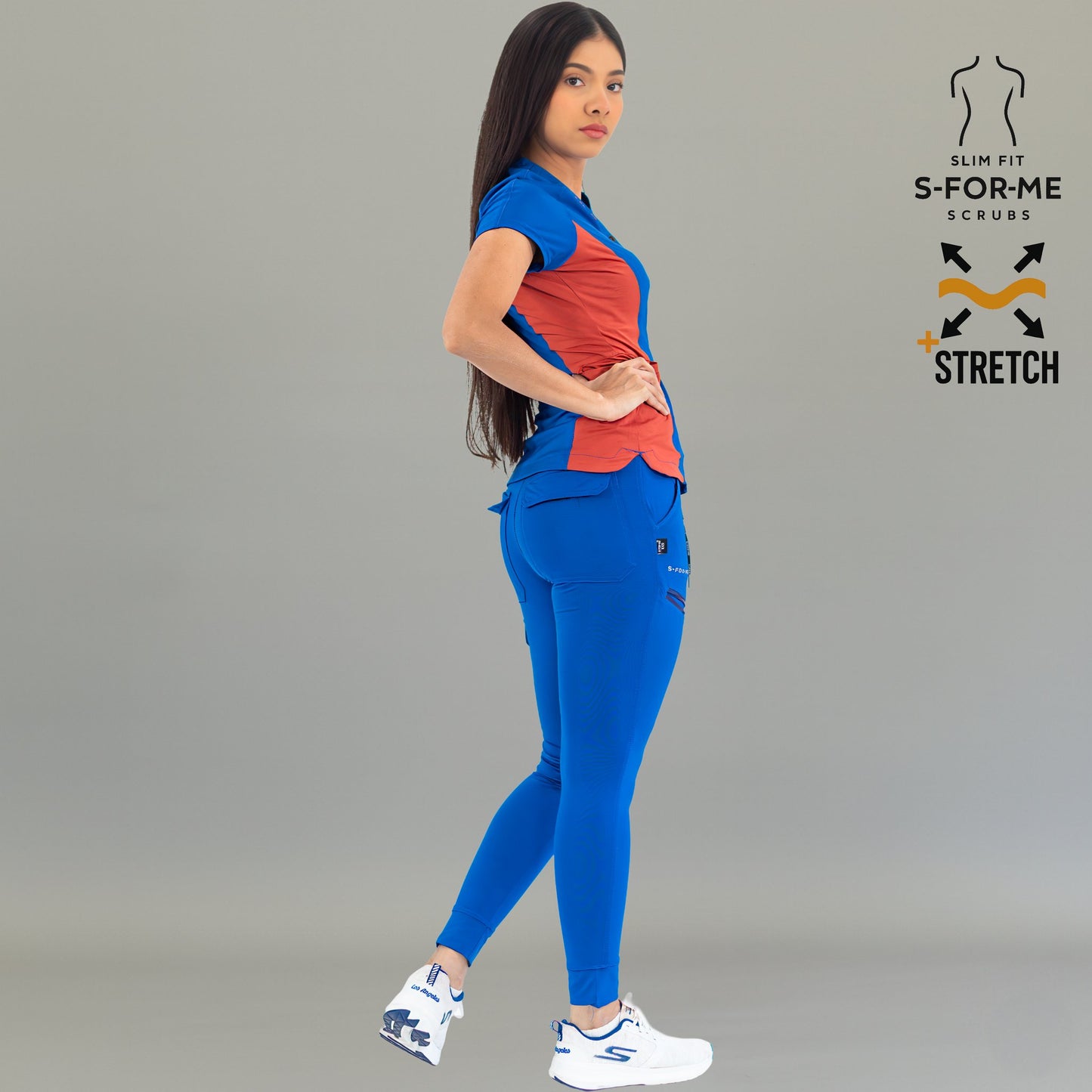 quirurgico azul rey para mujer corte slim fit con vistas en naranja