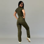Modelo de espaldas con jumpsuit médico mujer 945 Verde Olivo slim fit